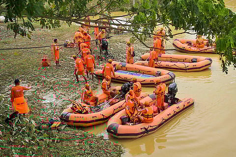 Tripura Floods: NDRF personnel during a rescue and relief operation